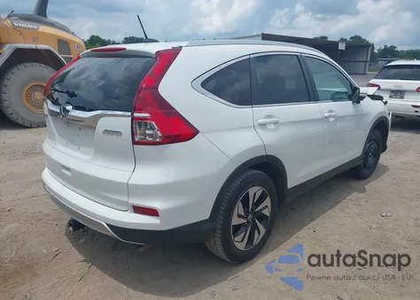 2016 Honda Cr-V Touring z USA, uszkodzony, nr VIN 5J6RM4H95GL118070